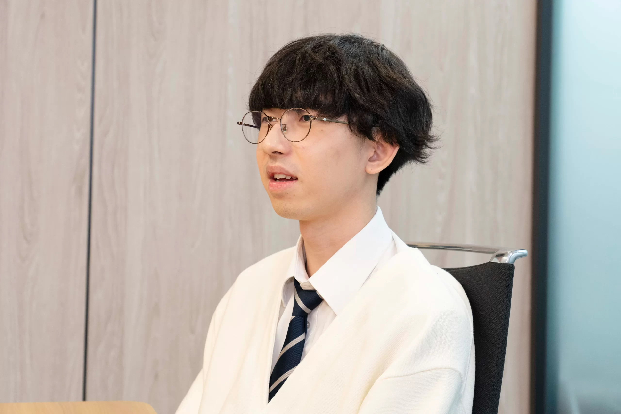 将来のビジョンを語るT.Yさんの写真